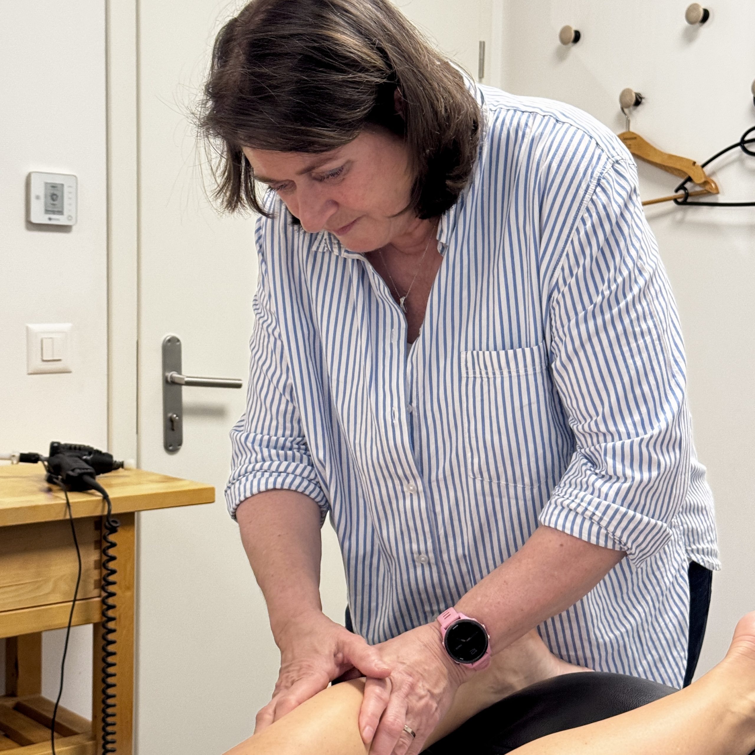Tiziana person massaging other person's foot